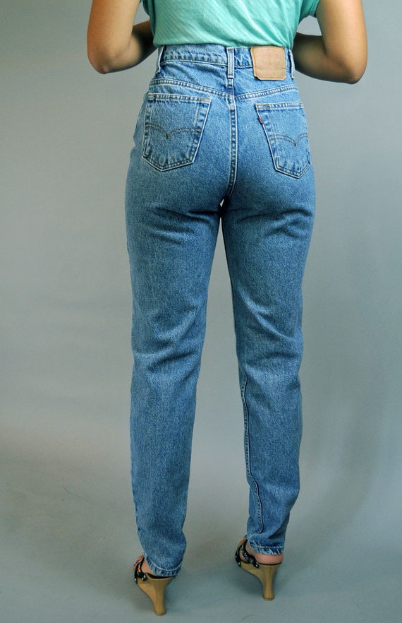80s vintage high waisted jeans / distressed LEVI 521 denim