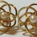 gold tone swirls screw on earrings vintage
