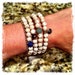 THE JET-SET 108 Bead Stretch Japa Mala with Lotus Seeds, Green Aventurine, Tigers Eye, Sodalite & Lotus Charm
