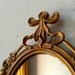 Ornate Mirror or Frame in Vintage Dark Gold