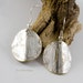 Small, trendy silver earrings, left and right earring designs