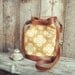 Leather and Canvas Round Bucket Messenger Bag With Bohemian Print In Brown, Gold and Orange Tones
