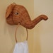 Adorable Wicker Elephant towel holder Cottage Style at Retro Daisy Girl