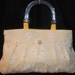 White eyelet and yellow purse with acrylic handles