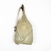 beige leather backpack / teardrop napsack