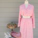 1960s pink and white cheetah print midi dress