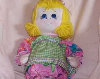 Baby Sis doll showing off her first tooth