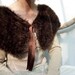Ortak Capelet, hand knitted in faux fur chocolate brown yarn with grosgrain ribbon tie, READY TO SHIP