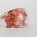 clear round faceted eco resin ring featuring copper flakes - size 8