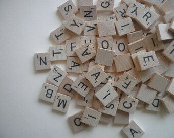 loose scrabble tiles 60 plus pieces . scrabble vowels included