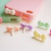 1 Mini Bowtie Dust Stopper Plugs 1 Piece