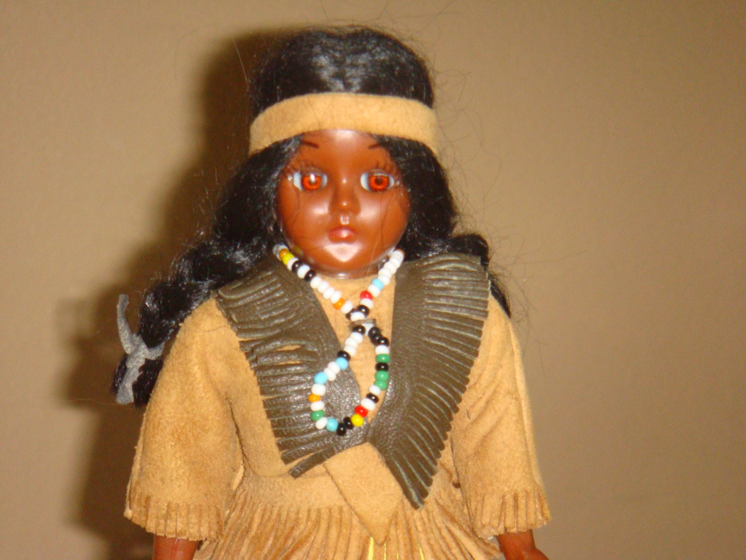 Vintage plastic indian dolls