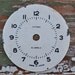 Vintage metal alarm clock face.dial.