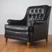 SALE Vintage Mid Century Black Naugahyde Club Chair with Tufted Back and Brass Capped Legs