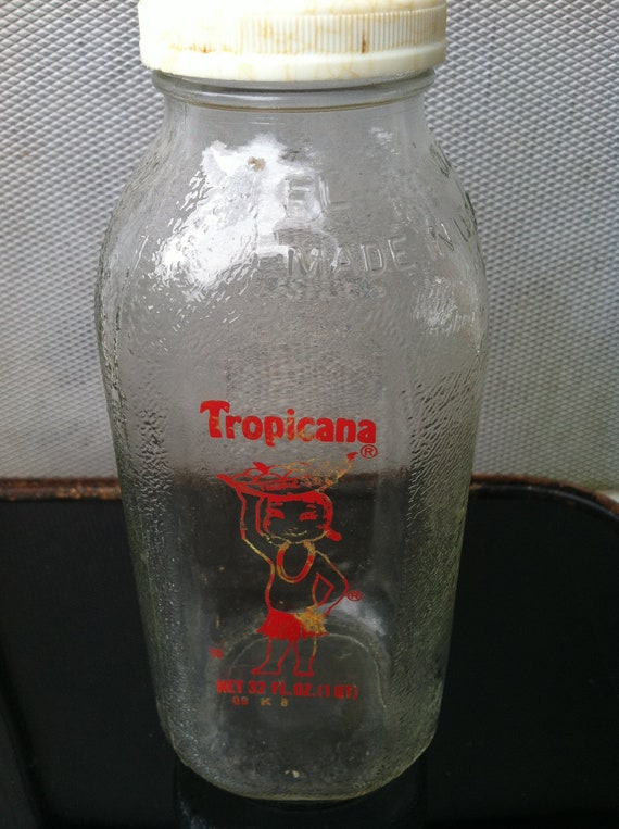 Items similar to Vintage Glass Orange Juice Bottle on Etsy