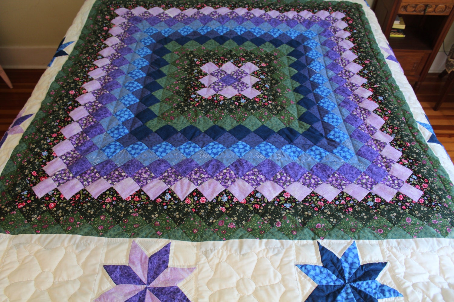 Amish handmade quilt in purple blue and green