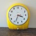 Vintage Yellow Poole Electrical Wall Clock, 1950's