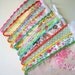 Fabric bunting flags with crochet edging.
