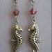 Earrings Seahorse Charm and Glass Bead In Antiqued Bronze