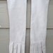 Vintage 1940's antique white kid gloves silk lined. Millay made in Western Germany.Size 7/1/2.Never worn.