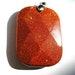 Large faceted goldstone pendant