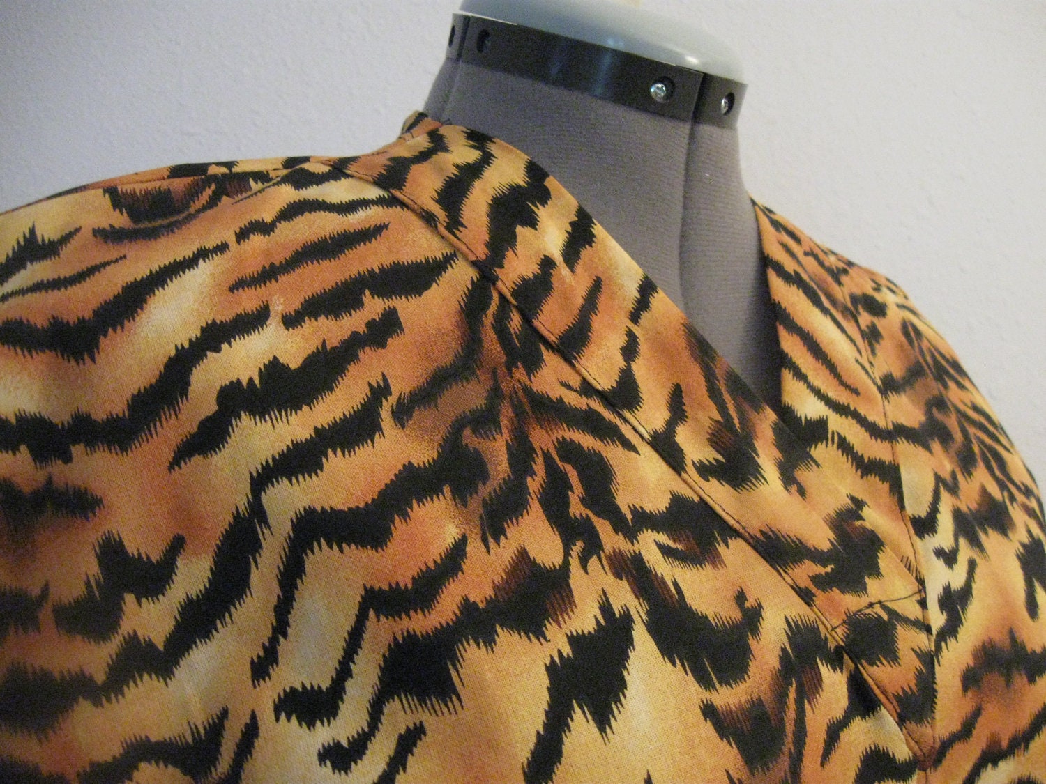 ANIMAL print scrub top size medium