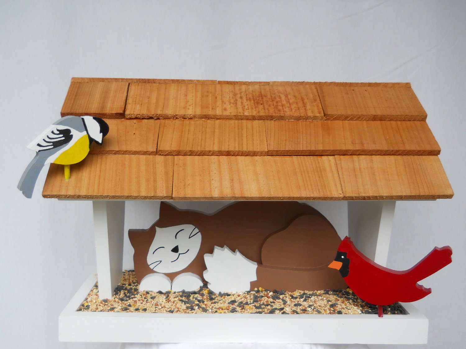sleeping cat bird feeder sleeping cat bird feeder