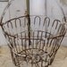 Rusty old antique egg basket distressed farmhouse kitchen decor Anita Spero