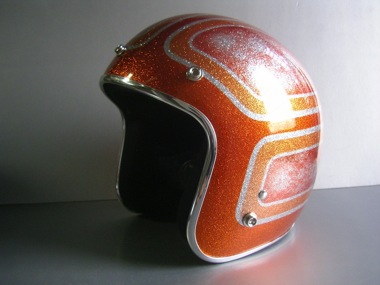 Vintage motorcycle helmet with custom paint metal flake