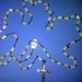 Large antique Mother of Pearl rosary with silver cross and center medal
