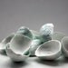 Walnut shells from stonewareng English fine bone china and copper oxide in teal color