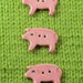 Handpainted ceramic pig buttons, x3