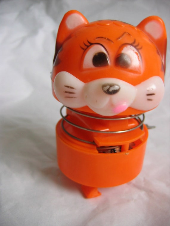 Vintage Bobble head wind up walker Toy. Orange plastic Cat.