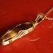 SALE - Men's Necklace Shining Tiger's Eye Spear - Wrapped in Gold Wire - 25% off
