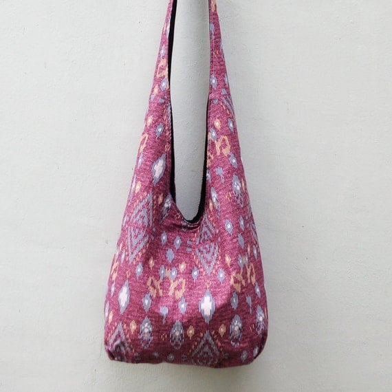 Hobo sling bag in magenta ikat pattern