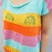 Rainbow cotton knit loose fit sweater with pixel pattern and open back