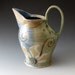 Handmade Clay Water Pitcher with Flower Motif