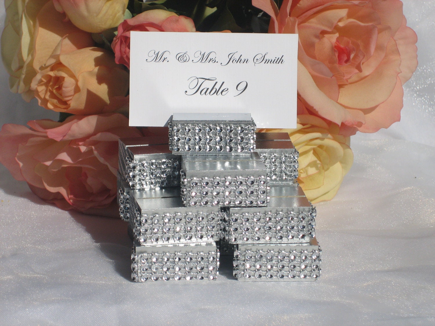 Silver Wood place card holders trimmed with a crystal wrapSet