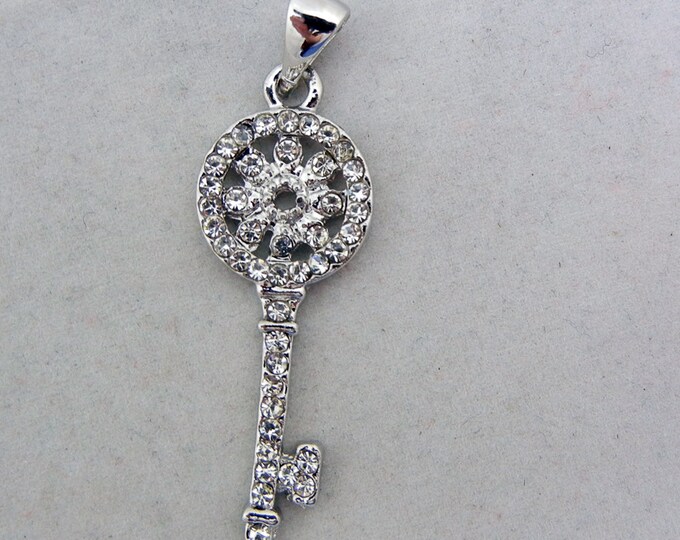 Small Rhinestone Encrusted Skeleton Key with Round Flower Top Pendant