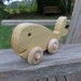 whale on wheels push toy poplar wood