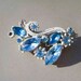 Vintage White washed brooch blue rhinestones