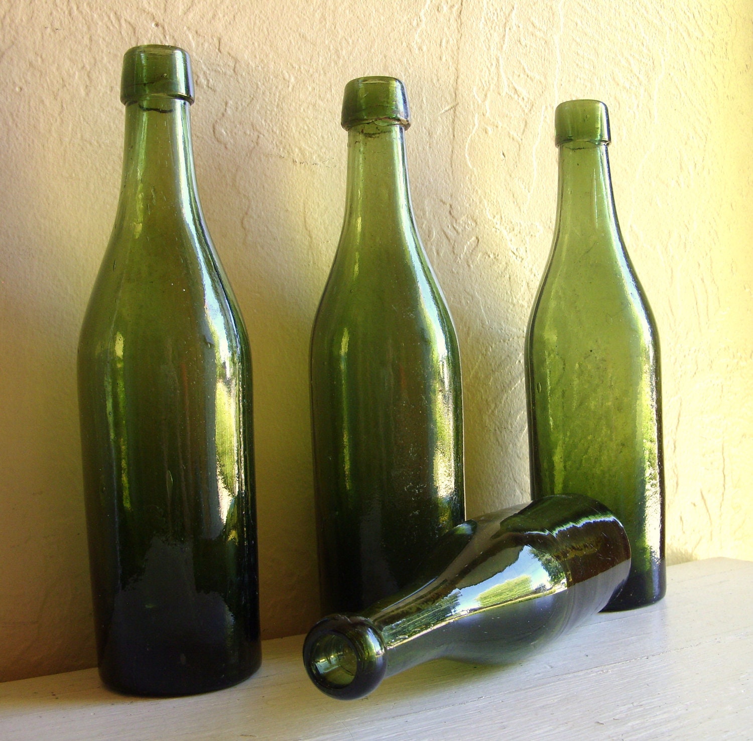 Download Dark Green Glass Bottles 4 Old Bottles Vignette Centerpiece Yellowimages Mockups