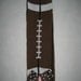 Boutique legwarmers football design with bow