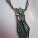 Cool old necklace with basketweave pendant and green stones and crystals
