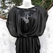 size 11 / 12 NEVER WORN SEQUINED black sequin, flowy party dress with store tag