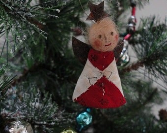 Antique Red And White Quilt Angel Christmas Ornament Named A Rising Star