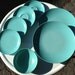 Lot of Teal Melmac Bowls, Plates, and Saucers