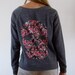 Grunge Skull Sweater with Flowers and heart shaped eyes