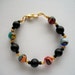Murano Millefiori Bracelet Large Multicolor and Black Glass Beads Little Golden Filigree Beads