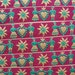 1 Yard of Tyrolean Couple on Eggplant Trim. 1 Inch Width.